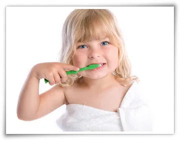 Little girl brushing her teeth